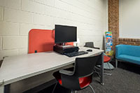 family room with computer and desk