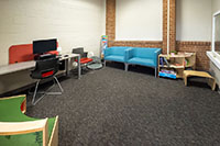 family room with computer and desk